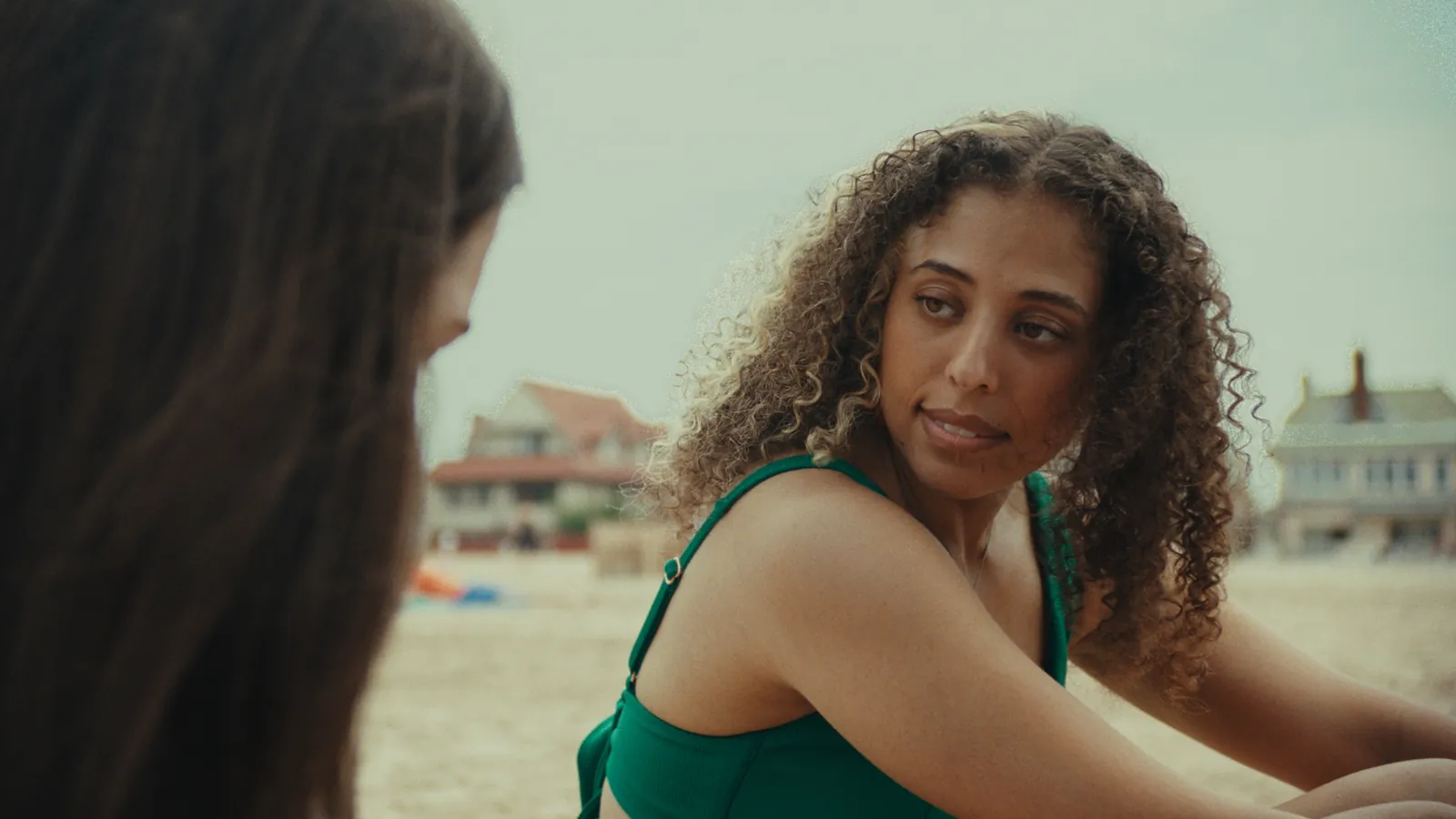 Perfect Love still — two women talking on the beach